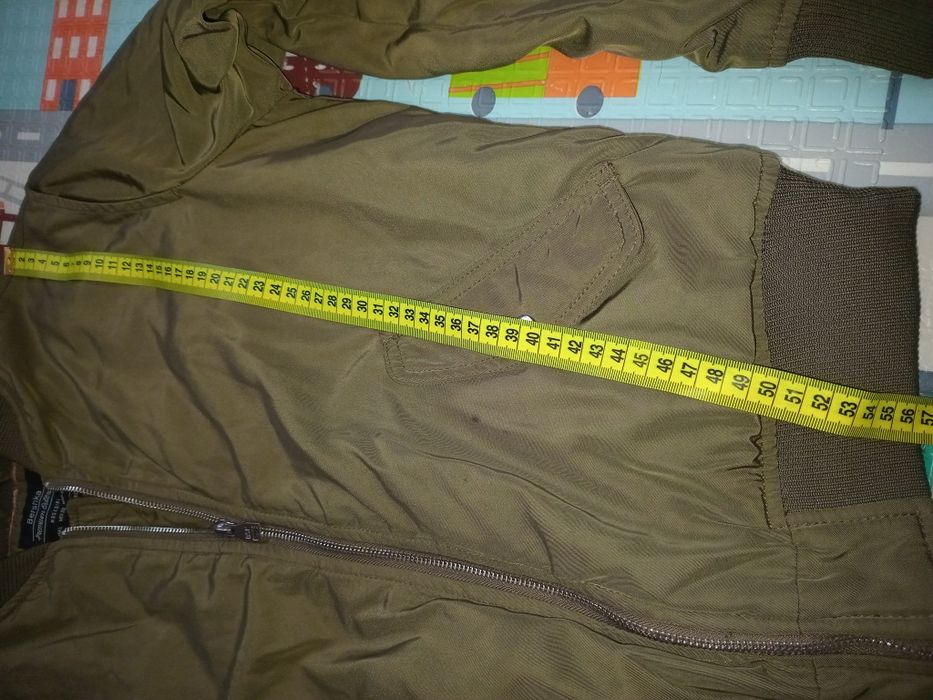 Жіноча осіння куртка  44