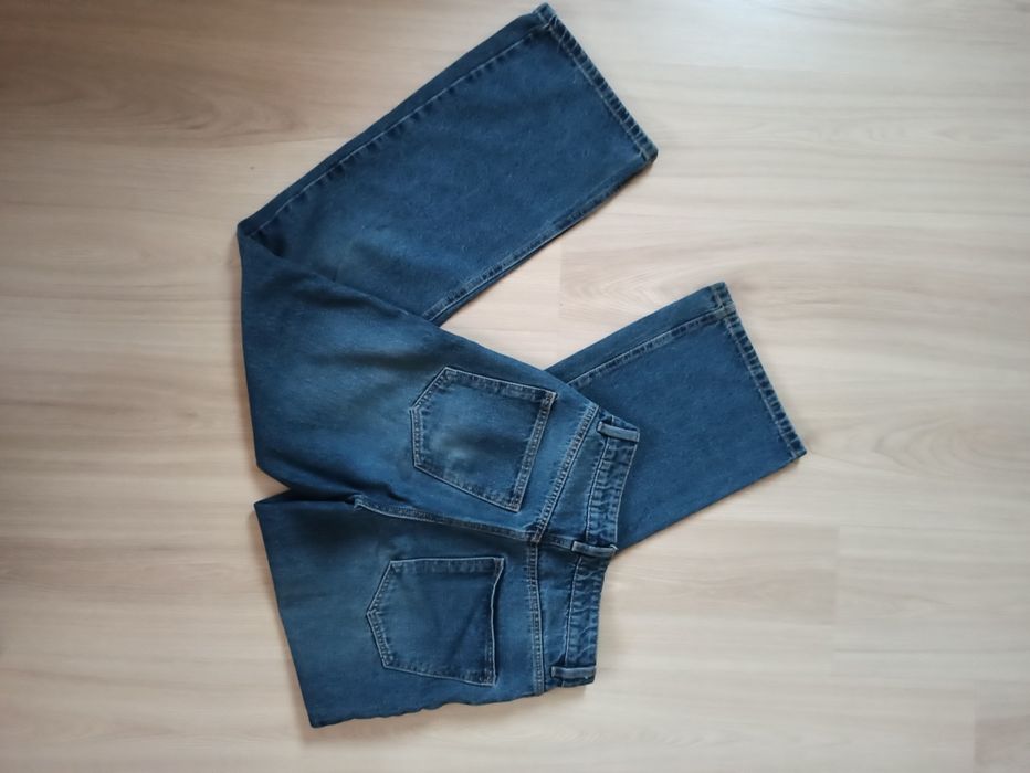 Spodnie dżinsowe granatowe z szerszą nogawką