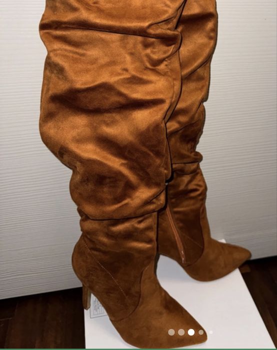 Botas cano alto enrugado