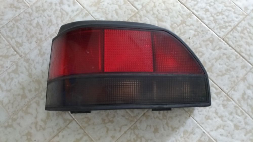 Farol Esq Renault Clio 94