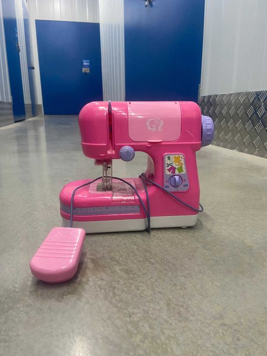 Maquina de costura de criança