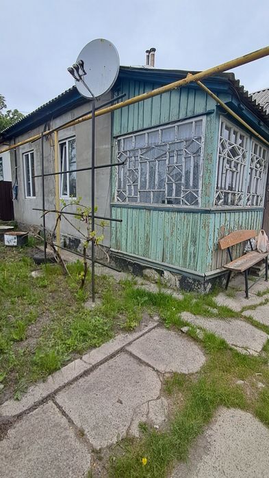 Продам 1/2 будинку в районі 1-ї школи