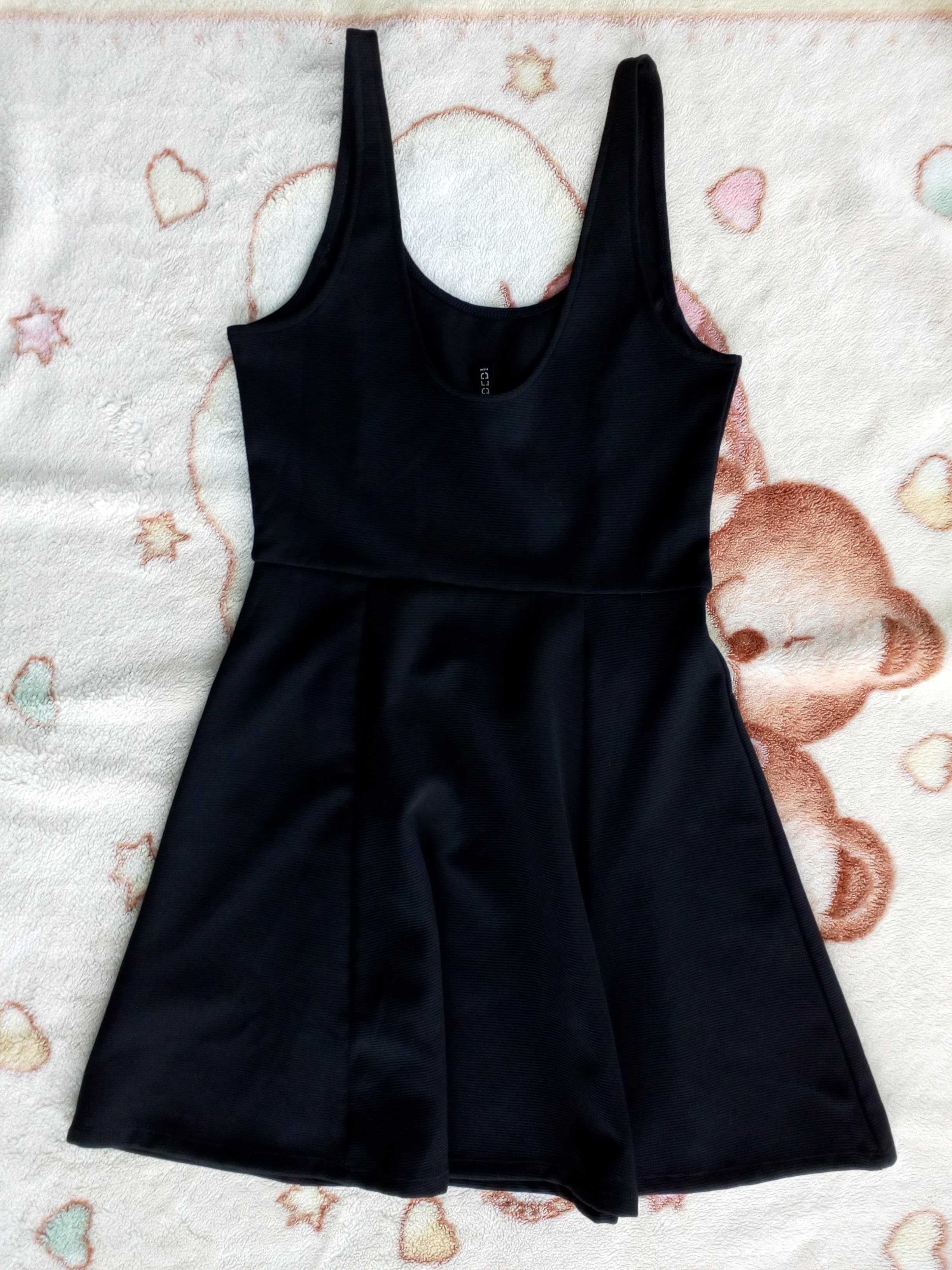Czarna elegancka letnia sukienka prążkowana H&M 38 jak nowa
