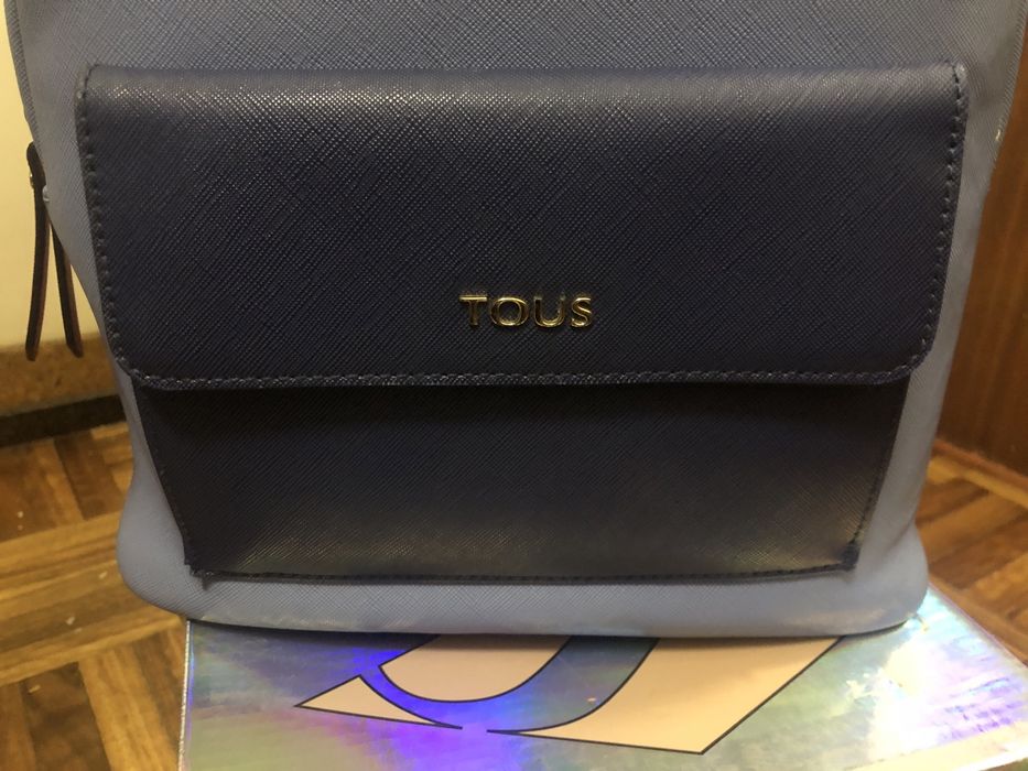 Mochila Tous com pega de mão e alcas com bolso exterior e tres interio