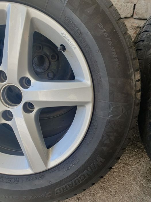 Felgi aluminiowe VW 16 cali +opony zimowe Nexen 215/65/16