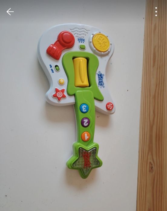 Brinquedo guitarra musical