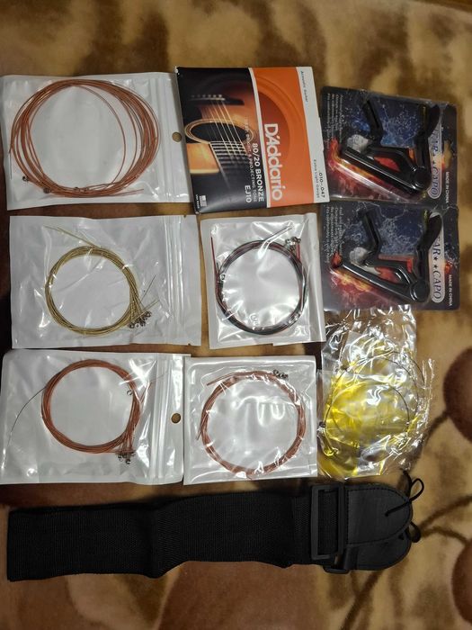 Струни  поштучно для гітари 1, 2, медіатор каподастр ремінь