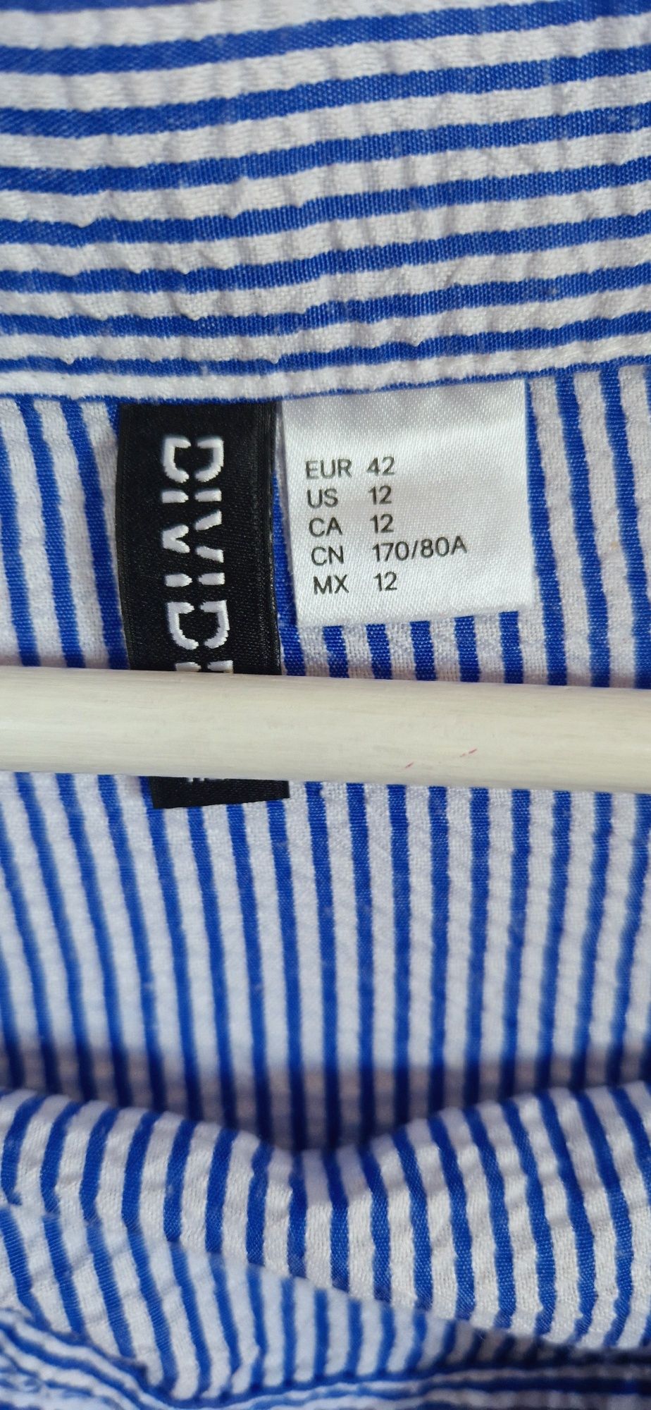 Biało-niebieska letnia spódnica z falbanką na zakładkę H&M r. L