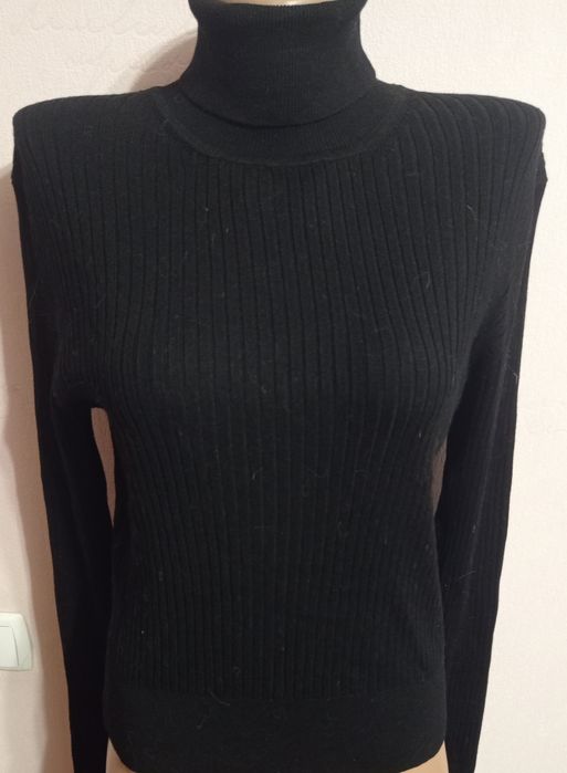 Жіночий гольф в рубчик .50 розміру.