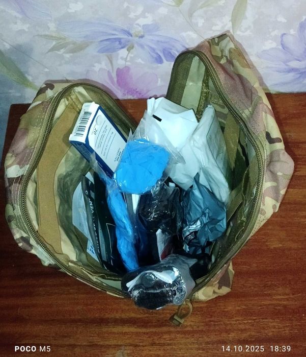 Професійна тактична аптечка IFAK з двома турнікетами CAT G7, RapidStop