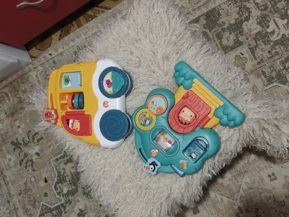 Розвивальні іграшки веселі тваринки fisher price