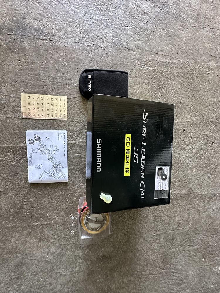 Cana Daiwa e carreto Shimano
