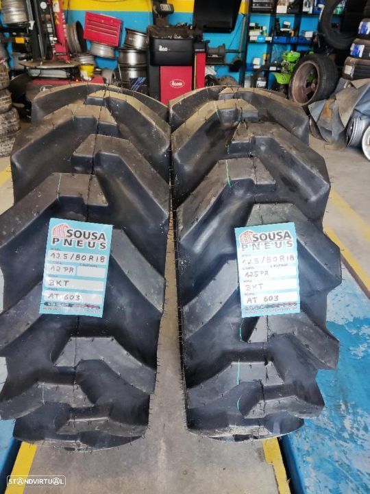 2 pneus novos 12.5/80r18 bkt rectroescavadora - oferta dos portes