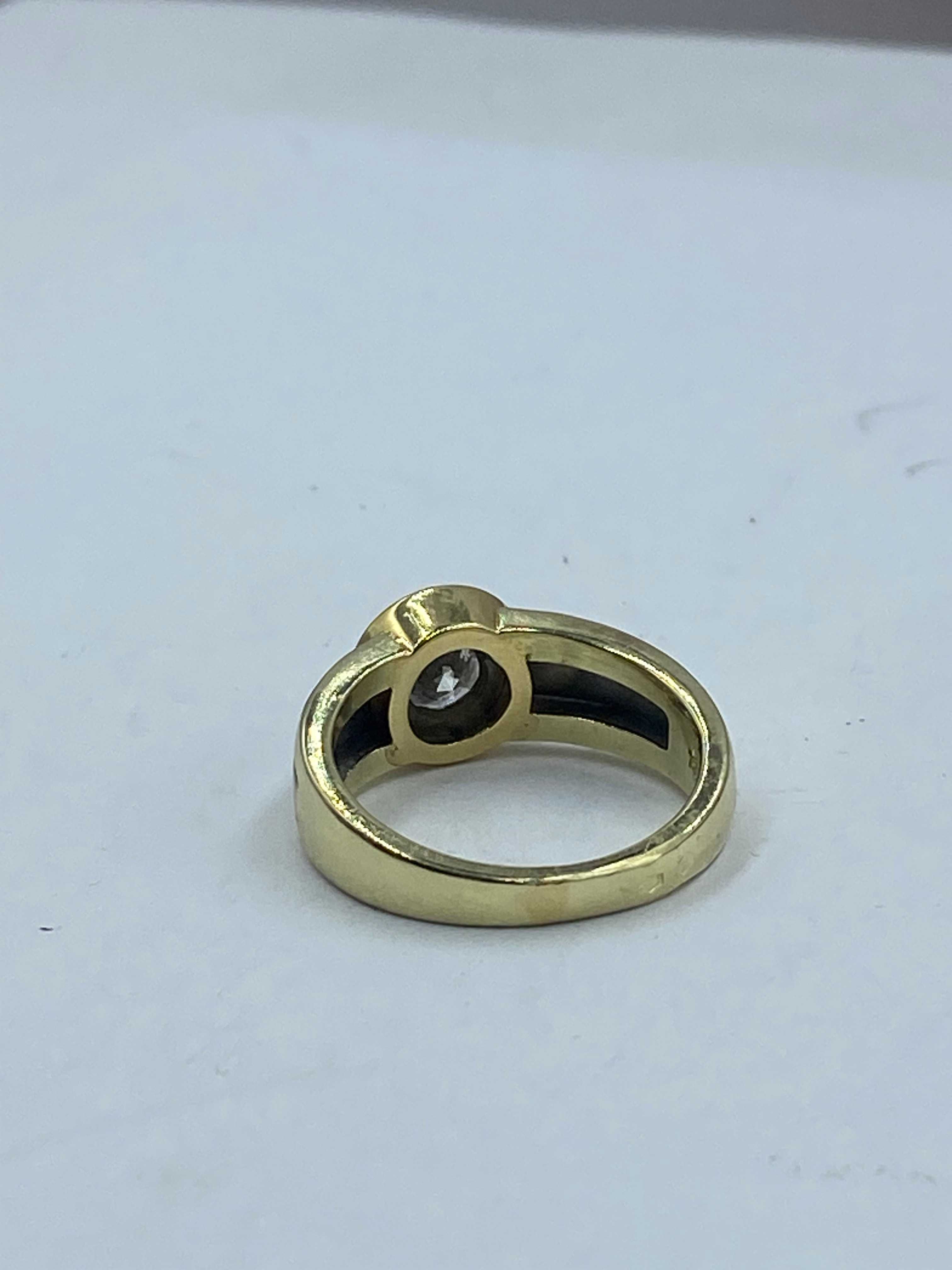 Złoty pierścionek z brylantem 585 1ct