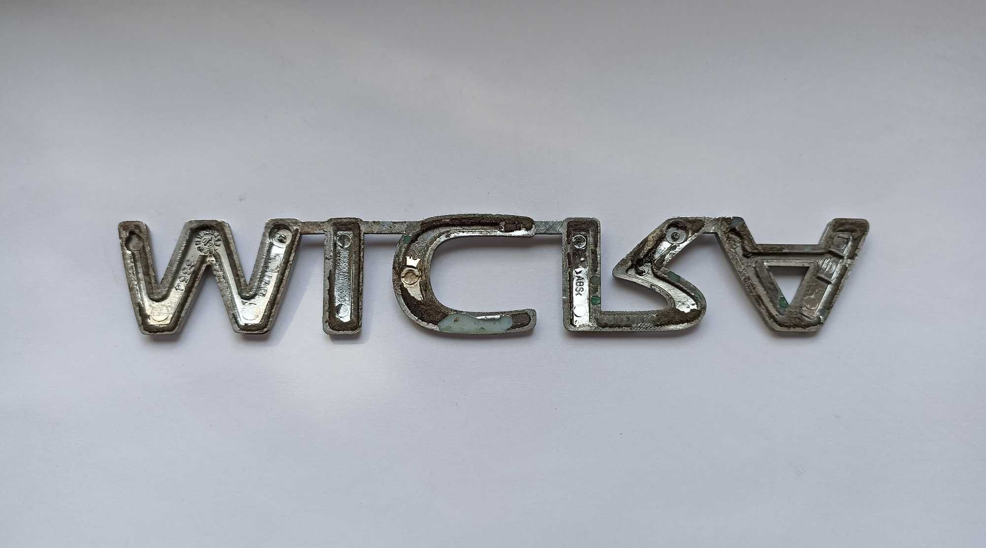 Napis emblemat Nissan Micra