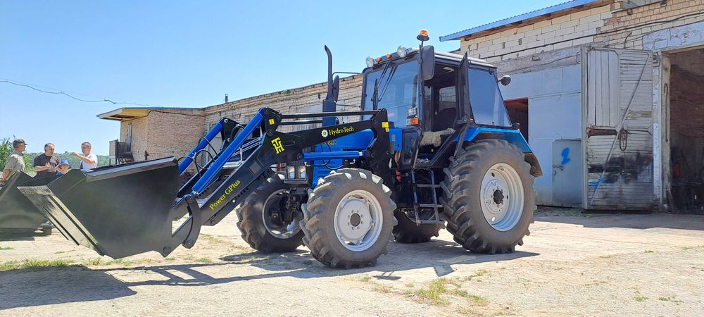 Быстросйомный фронтальный погрузчик кун Юмз