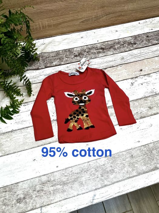 Nowa bluzeczka, cekiny, rozmiar 0-1 mc