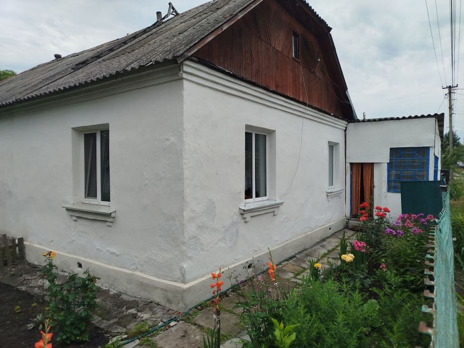 Продається частина будинку в центральній частині м.Малина