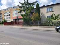 Dom z lokalem usługowym i garażami, Inowrocław