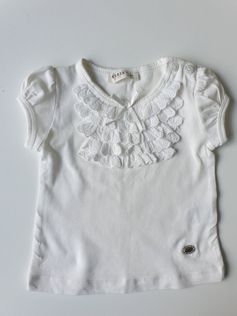 Elegancka biała bluzka z falbanami r.74