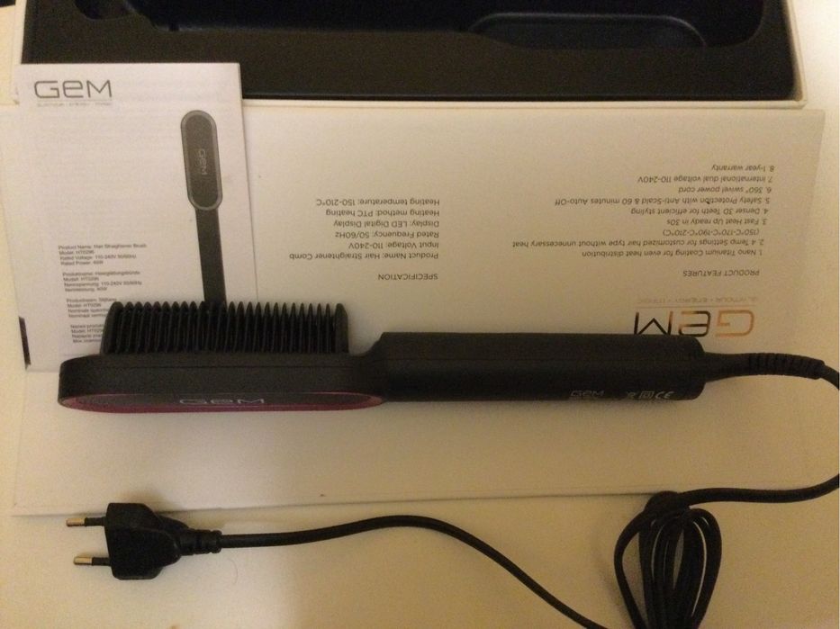 Утюжок, гребінець-вирівнювач для волосся.