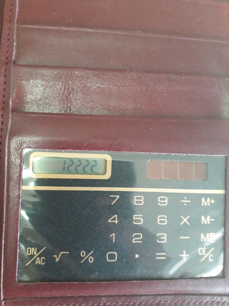 Carteira para cheques com calculadora