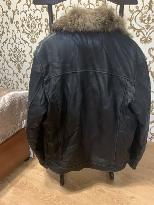 Мужская  кожаная куртка с мехом волка