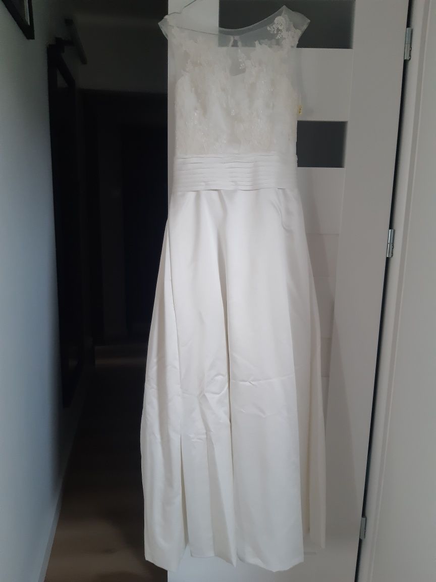 Elegancka suknia ślubna Lisa Ferrera kolor śmietankowa biel z kieszeni