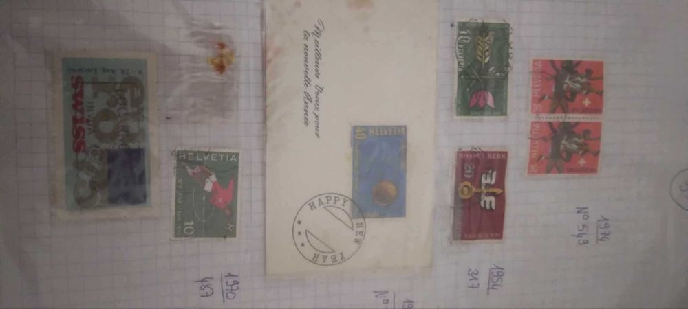 selos queen Elizabeth e outros postais antigos