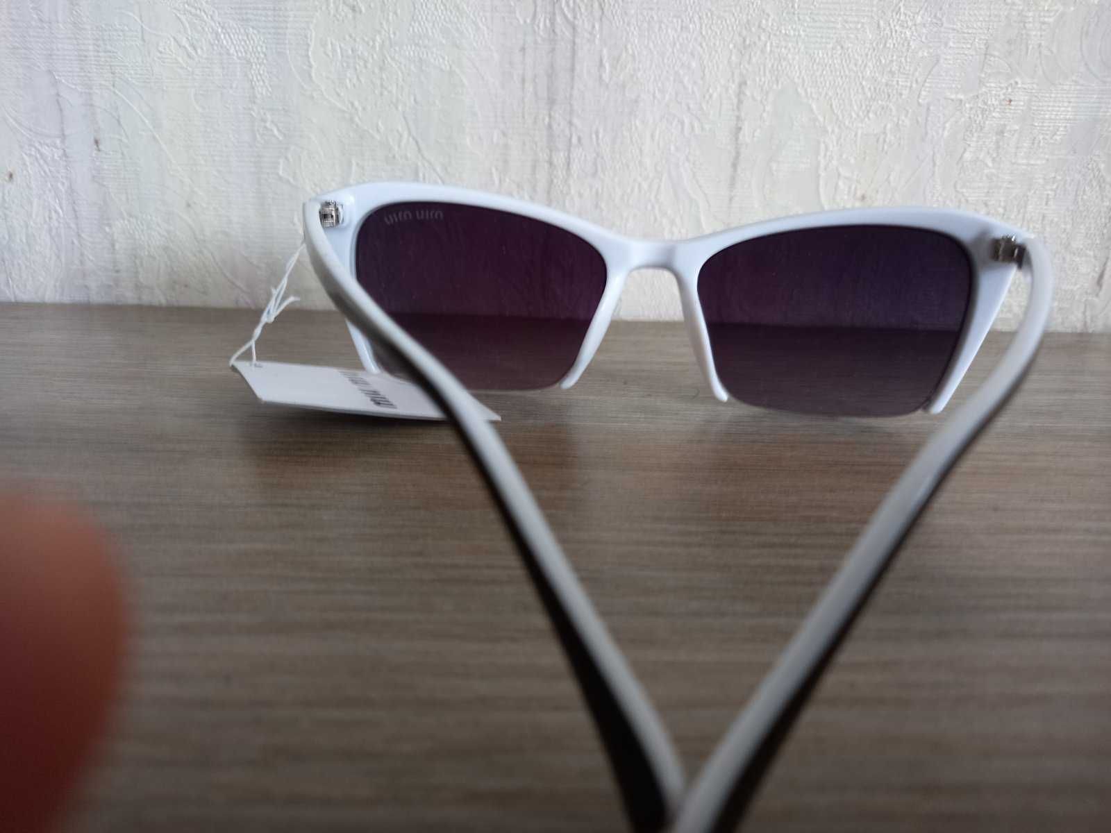 Солнцезащитные очки Miu Miu