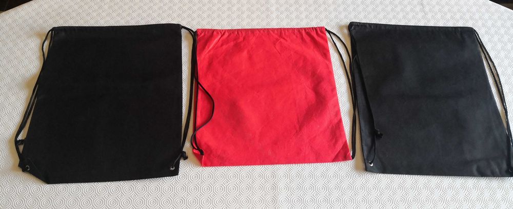 8 mochilas tecido não-tecido