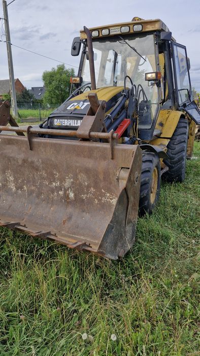 Koparko ładowarka CAT 438C