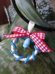 Wisiorek koło okrągły kokarda czerwony niebieski kremowy eko handmade