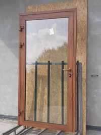 Drzwi aluminiowe 109X210 złoty dąb