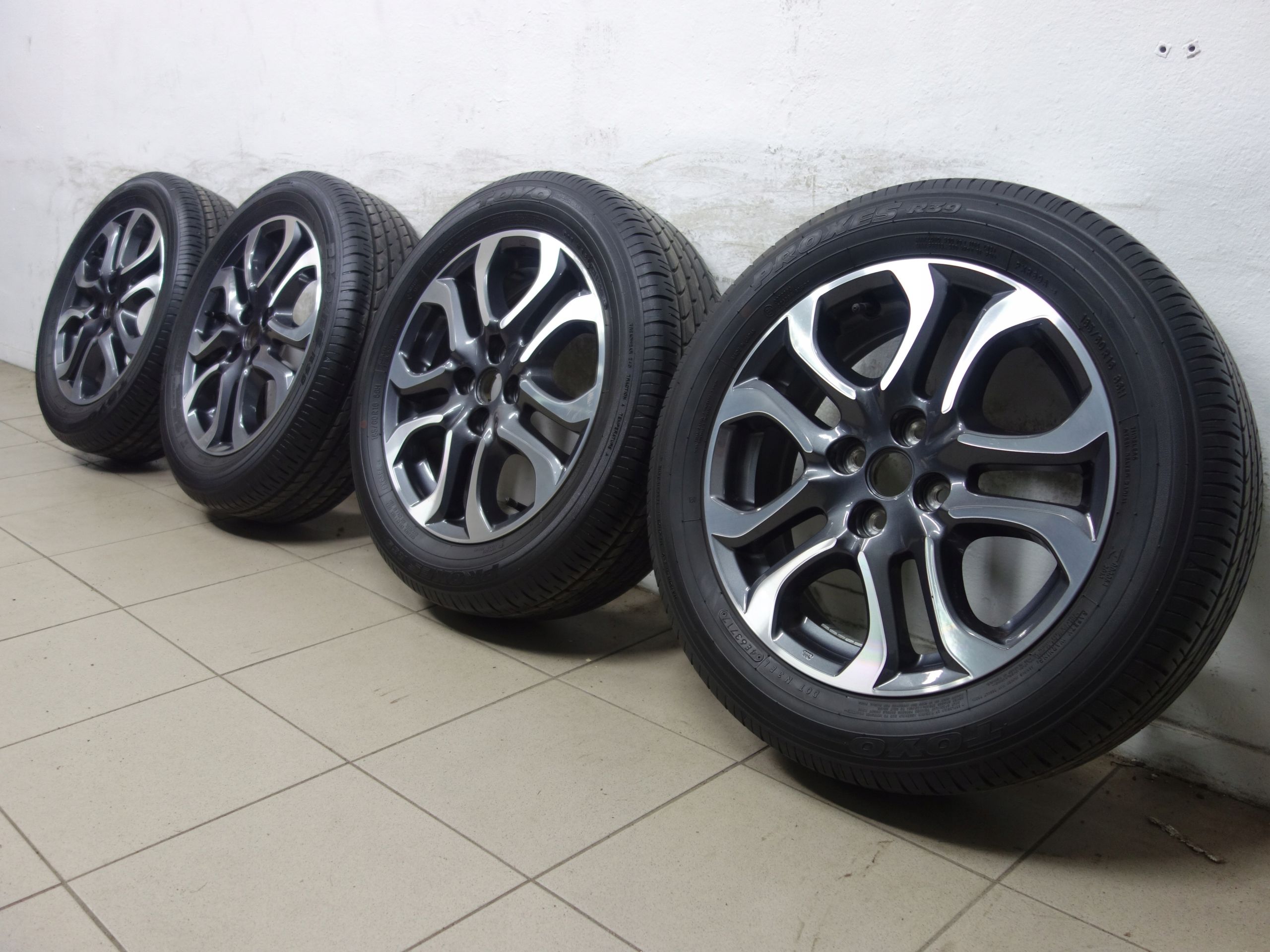 185/60R16 4x100 Koła letnie Mazda 2 OE opony Toyo Proxes R39 ExtraStan