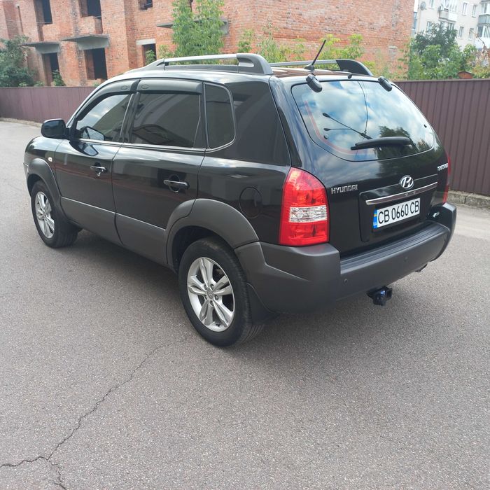 Hyundai Tucson, I покоління  2.0 DOHC МТ (142 к.с.) 4WD  Base