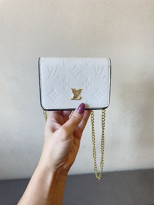 Mala tira colo de mulher