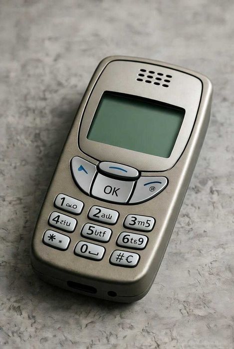 Приму в дар кнопковий мобільний телефон