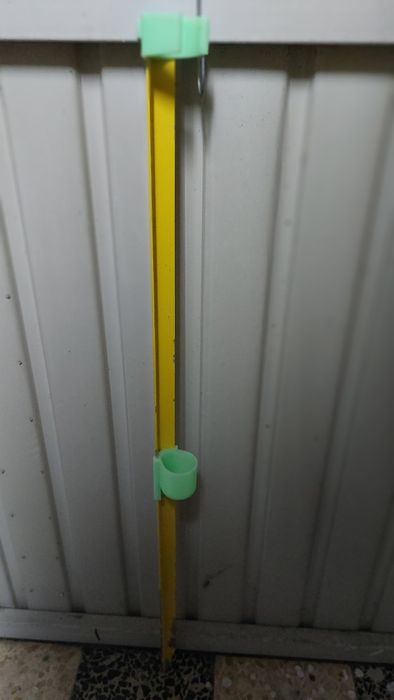 Suporte para cana de pesca.