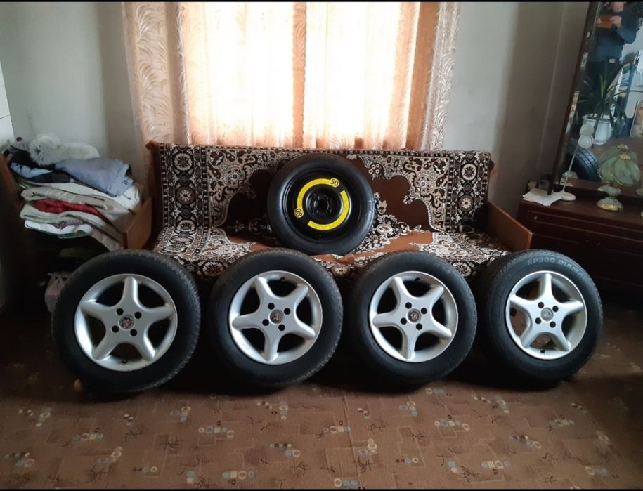 Продам Оригінальні тітанчікі,з Новою німецькою резиною.