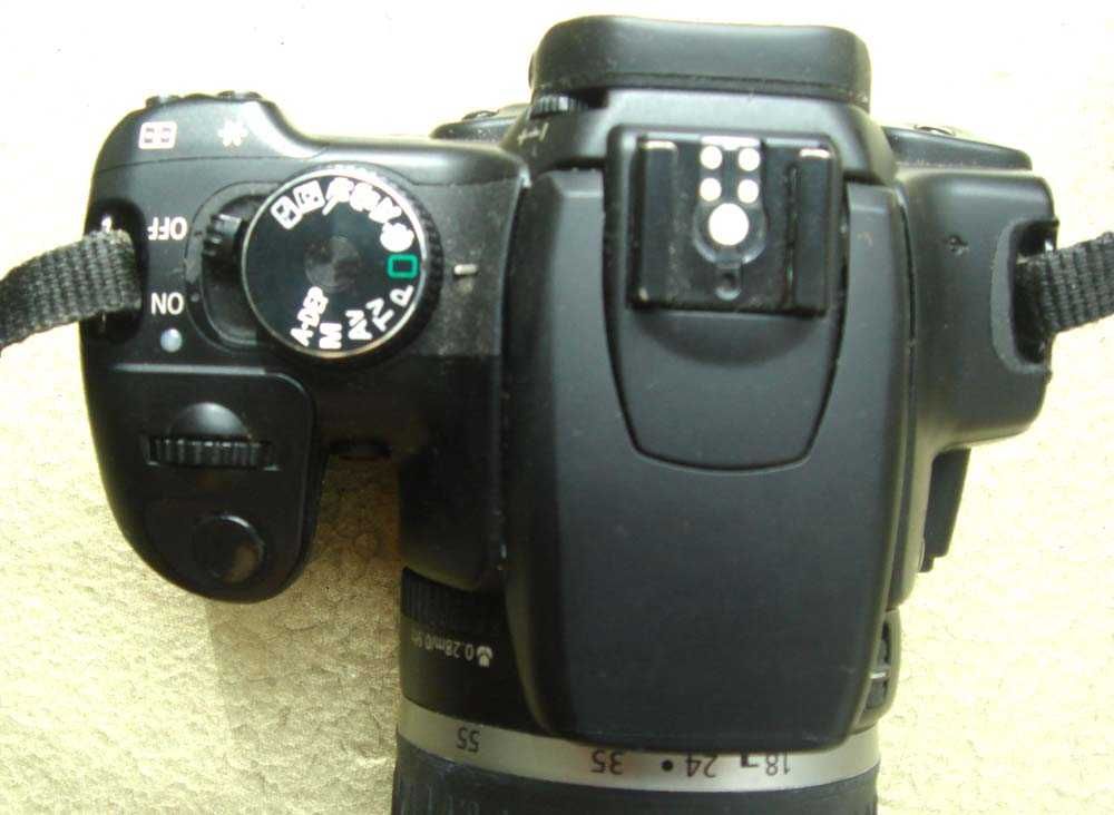 Lustrzanka Canon EOS XTi.