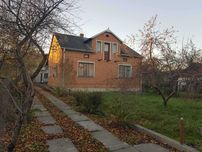 Житловий будинок та земельна ділянка 7,9 сот. м. Кам'янка-Бузька