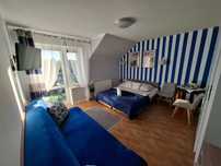 weekend w Łebie noclegi pokoje apartamenty domki