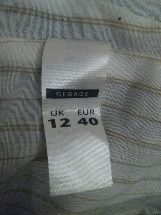 Żakiet-płaszczyk w kolorze zgniłej zieleni