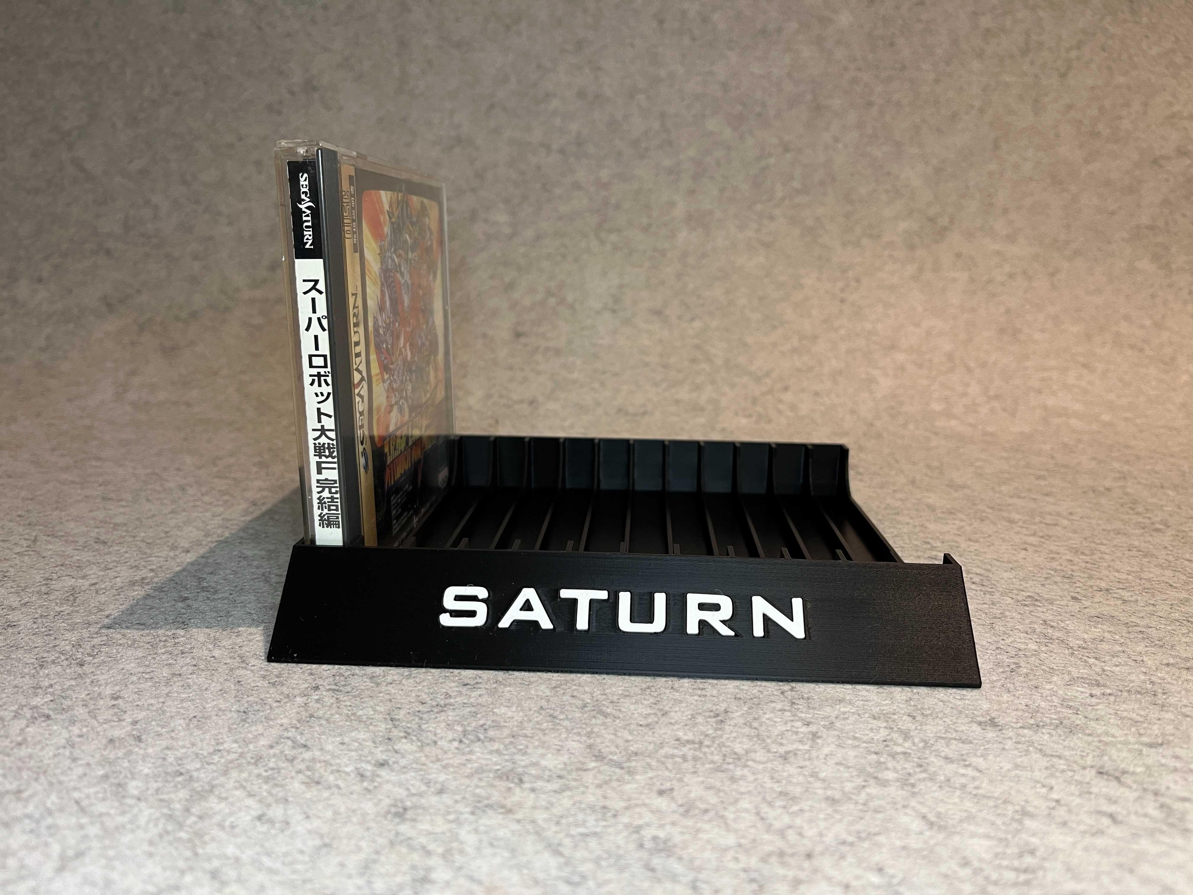 Stojak podstawka na 12 gier Sega Saturn w wersji JP