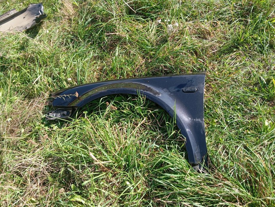 Błotnik przedni lewy przód Volkswagen Passat B5 Lift LC9Z