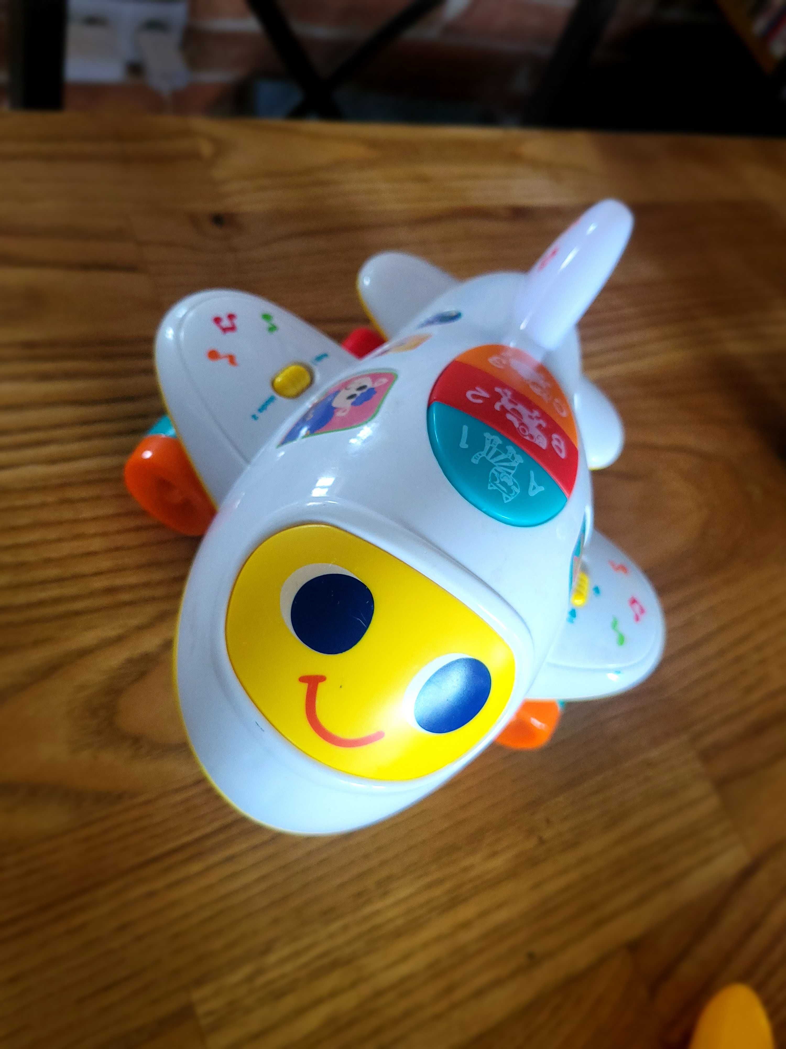 Zabawki motor Clementoni, samolot, książka z wierszykami Fisher Price