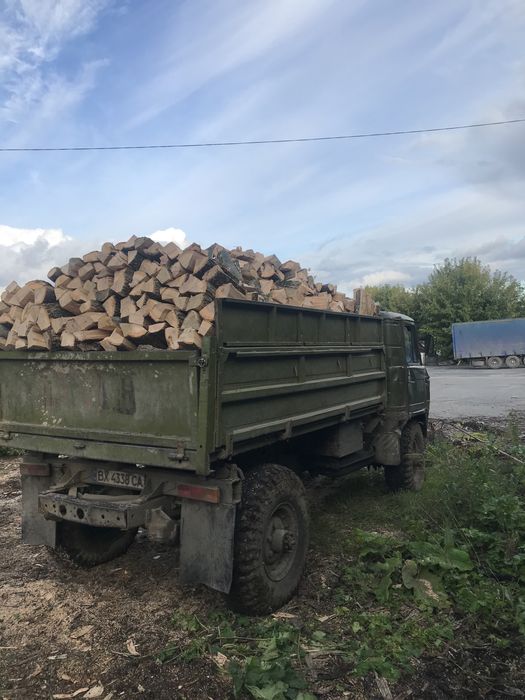 Мерседес самосвал маніпулятор доставки дрова