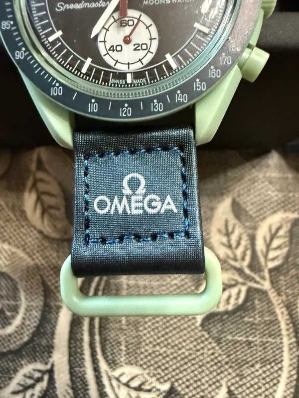 Omega x Swatch SO33G100 – Żywioły Planety