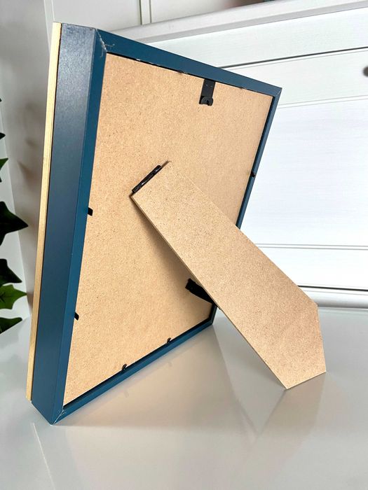 Moldura de madeira azul e dourada